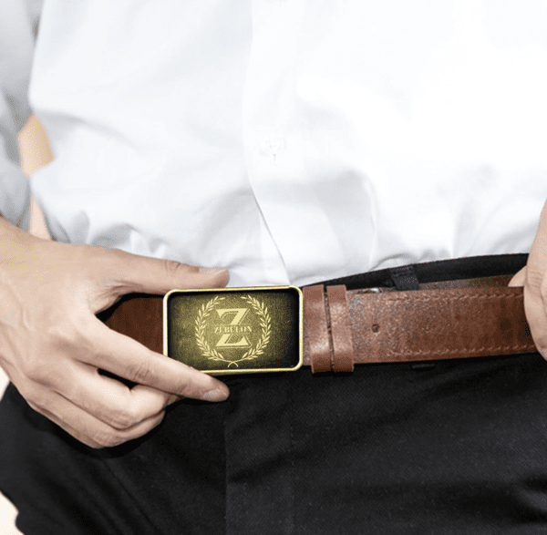 A man wearing a brown belt with a gold buckle.